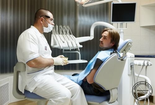 Консультация пациента стоматологии